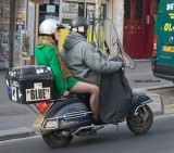 girl in black pantyhose on a scooter