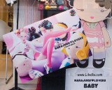 Latex kids clothes in street ads