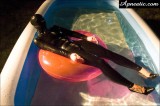 apnea-47 in latex catsuit, latex hood and high heels swimming in the pool