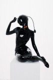 black shiny latex encasement