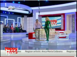 Zlata in a green shiny catsuit on TV Romania