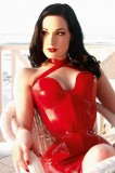 Dita, red latex and criss-crossed straps