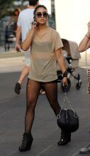  candid_pantyhose_829_black_running_with_shorts.jpg