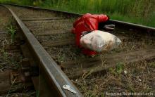  asphyxiation-bondage-43-plastic_bag_latex_catsuit_railway.jpg