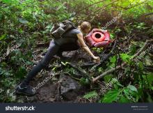  stock-photo-the-traveler-stands-next-to-rafflesia-flower-the-largest-flower-in-the-world-1022848327.jpg