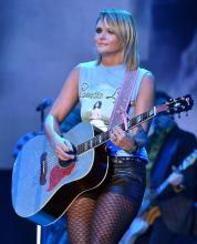  miranda_lambert-03_black_patterned_pantyhose_leather_mini_shorts.jpg