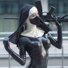  cosplay_54_latex_nun_with_a_gun.jpg