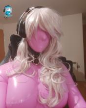  latex-encasement-55_pink_catsuit_hood_headphones.jpg thumbnail