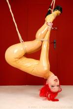  suspension_bondage-43_transparent_latex_catsuit_high-heels.jpg thumbnail