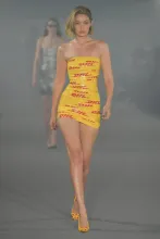  model-gigi-hadid-flaunts-dress-made-of-packing-tape-at-v0-ls0iq6ulklrd1.webp