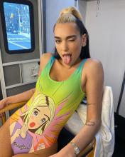  dua_lipa-13_in_fishnet_pantyhose_swimsuit.jpg