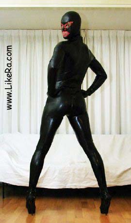 Like Ra in latex catsuit, latex mask and high heels